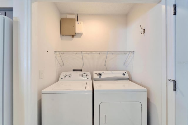 laundry area with washer and dryer and laundry area