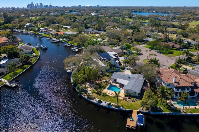 bird's eye view featuring a residential view and a water view