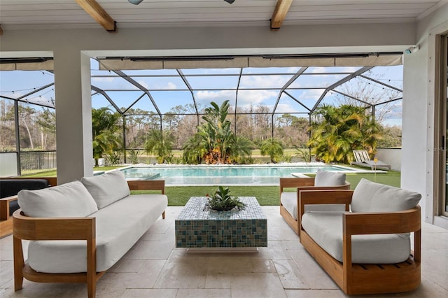 view of patio featuring a ceiling fan, glass enclosure, an outdoor pool, and an outdoor hangout area