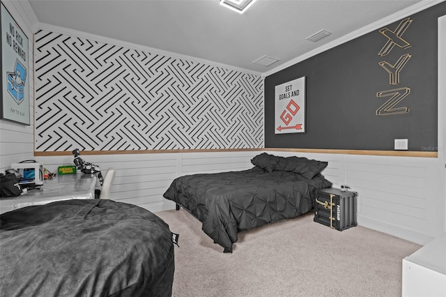 bedroom featuring light carpet, visible vents, and crown molding