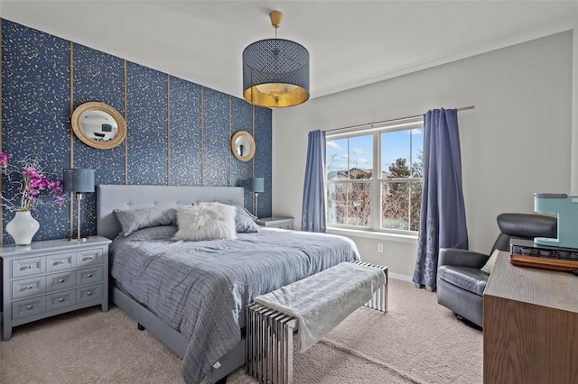 bedroom featuring light carpet, baseboards, and wallpapered walls