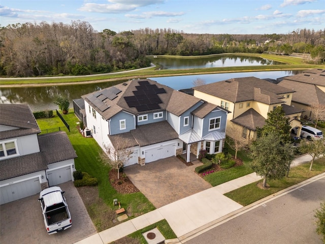 drone / aerial view with a water view