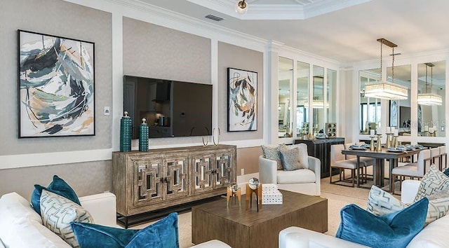 living room with visible vents and crown molding