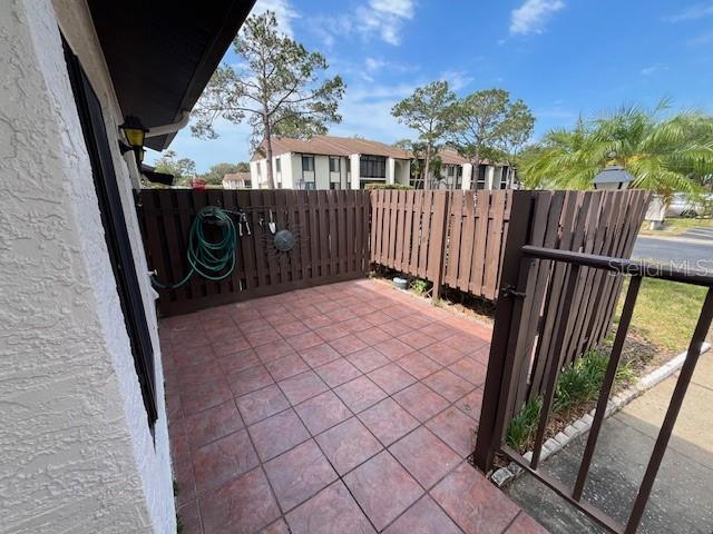 view of patio / terrace with fence