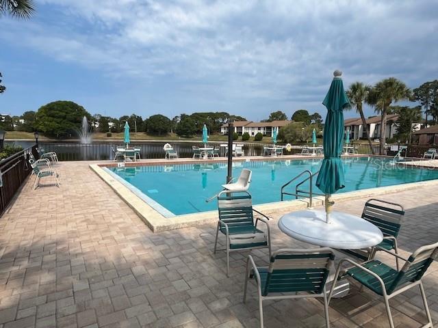 pool featuring a patio area