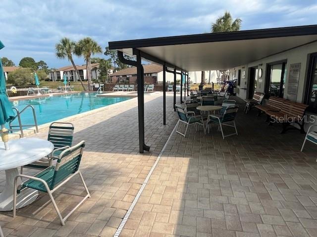 pool with a patio area