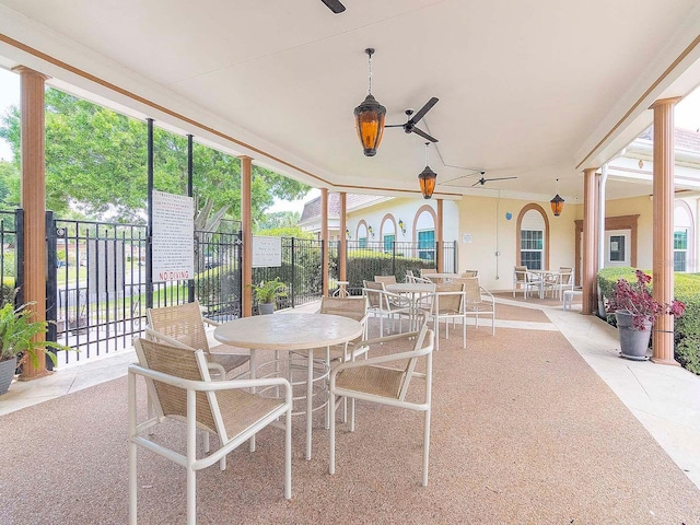 sunroom featuring decorative columns