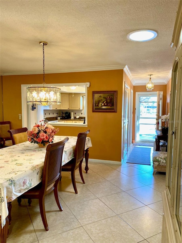 dining room with light tile patterned flooring, crown molding, a textured ceiling, and an inviting chandelier