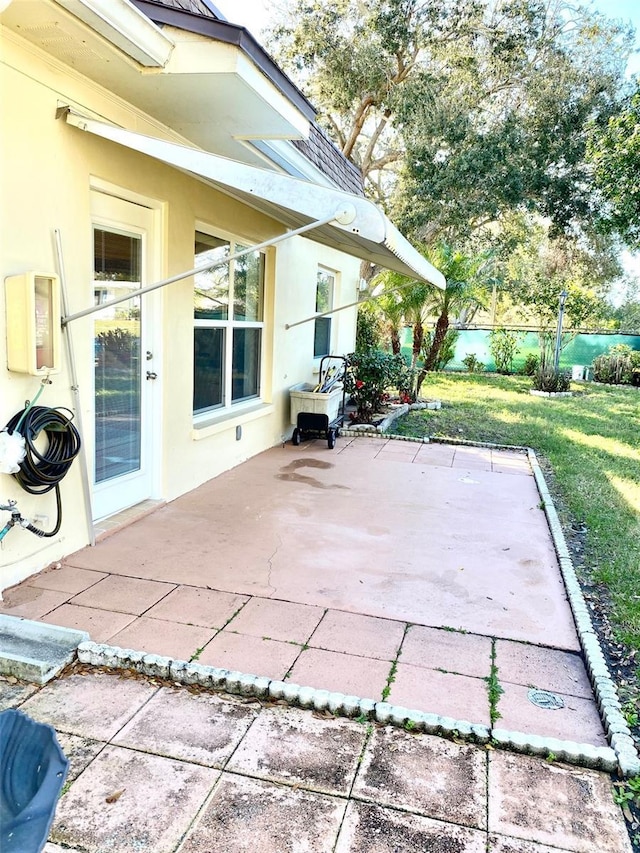 view of patio with fence