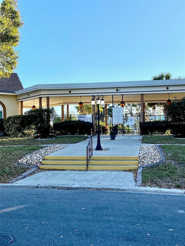 view of community with fence