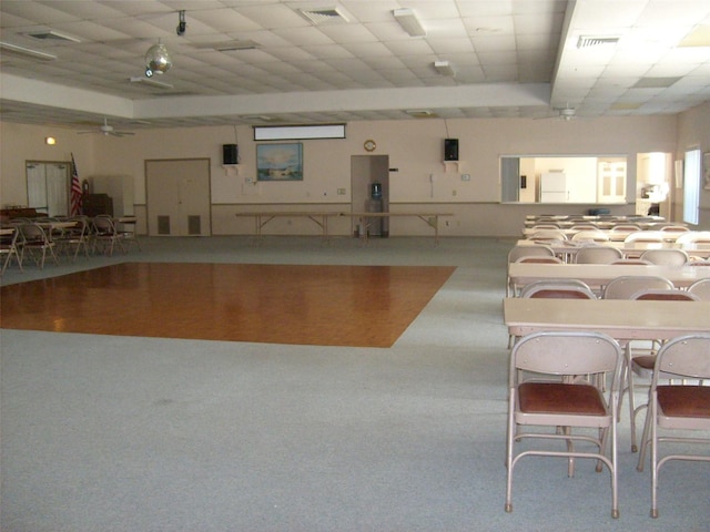 miscellaneous room with visible vents and carpet flooring