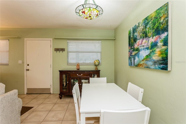 dining space with light tile patterned flooring