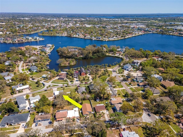 bird's eye view featuring a residential view and a water view