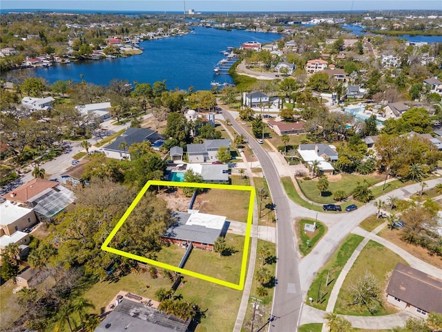 27 Park Ave, Tarpon Springs, FL 34689 - aerial perspective of suburban area featuring a nearby body of water and property parcel outlined