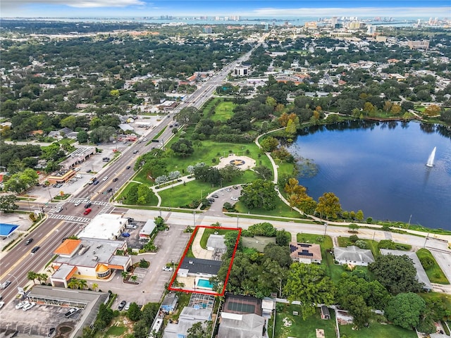 birds eye view of property with a water view