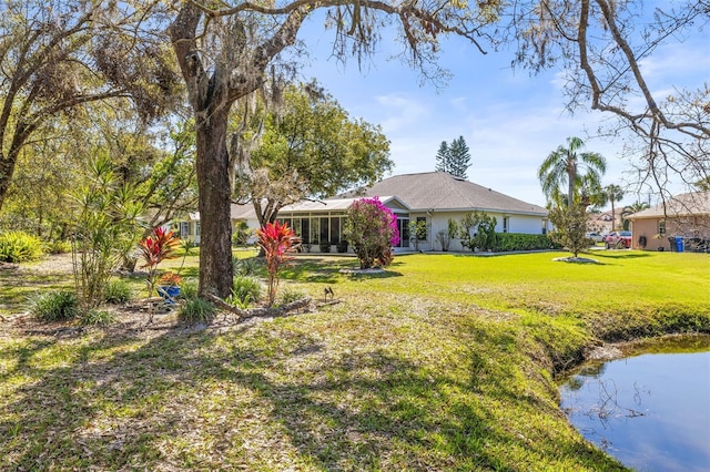 view of front of property with a front lawn