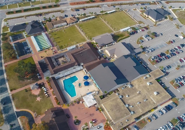 birds eye view of property with a residential view