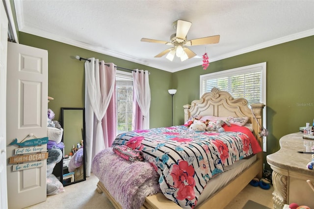 bedroom featuring carpet floors, multiple windows, and ornamental molding