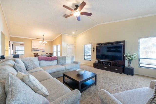 living room featuring carpet, ornamental molding, vaulted ceiling, and a wealth of natural light