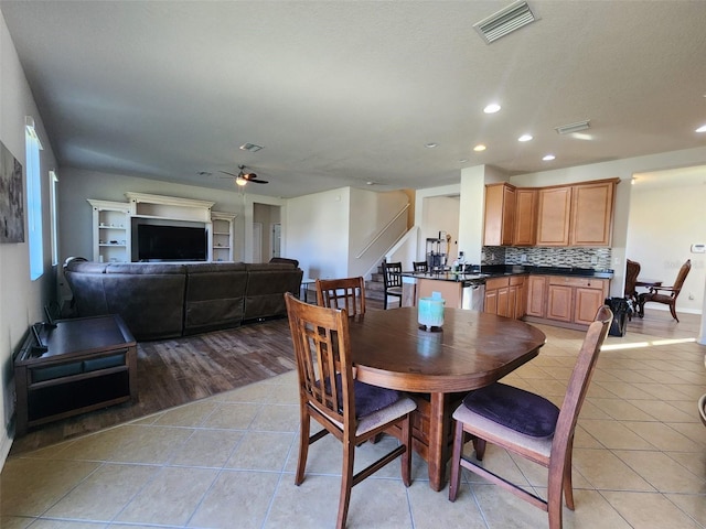 dining area with recessed lighting, stairs, visible vents, and light tile patterned flooring