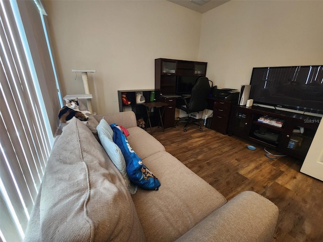 living area with dark wood-type flooring