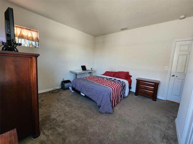 bedroom featuring carpet flooring, visible vents, and baseboards