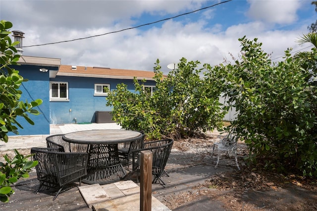 view of patio with outdoor dining space