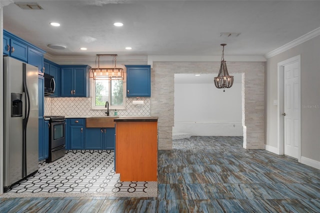 kitchen featuring appliances with stainless steel finishes, blue cabinets, crown molding, and visible vents