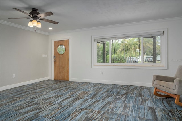 interior space featuring a ceiling fan, baseboards, crown molding, and recessed lighting