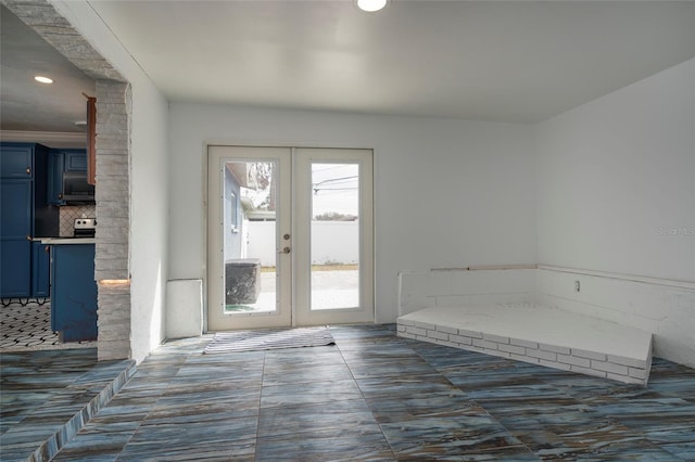 entryway with recessed lighting and french doors