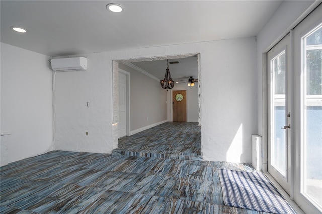 unfurnished room with crown molding, an AC wall unit, and recessed lighting