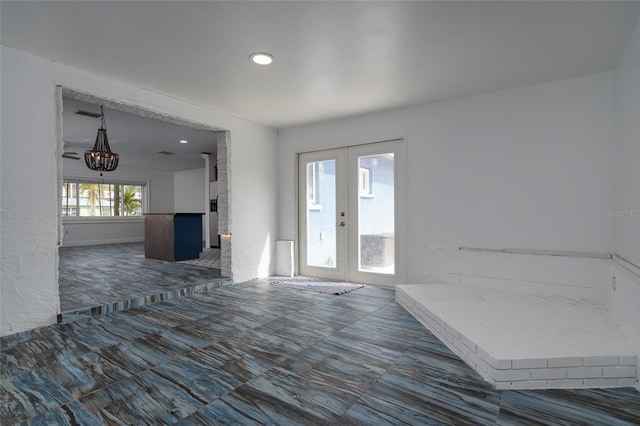 entryway with recessed lighting, visible vents, and french doors