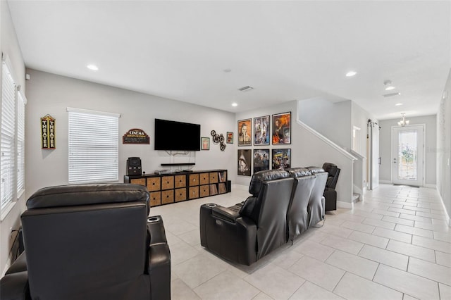 living room with light tile patterned floors, baseboards, visible vents, and recessed lighting