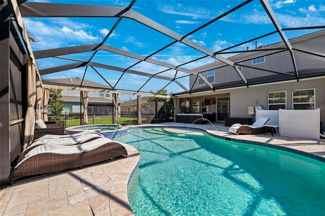 4195 Welling Ter, Land O Lakes, FL 34638 - view of pool featuring a patio area, a pool with connected hot tub, and glass enclosure