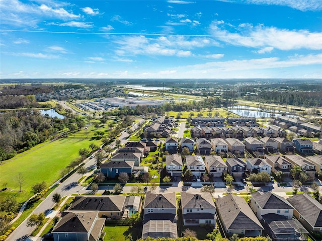 4195 Welling Ter, Land O Lakes, FL 34638 - aerial view of residential area featuring a large body of water