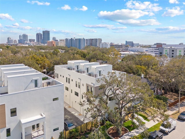 birds eye view of property with a view of city