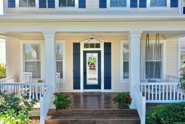 doorway to property featuring a ceiling fan