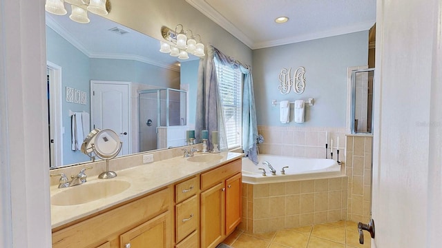 bathroom featuring a garden tub, tile patterned flooring, a sink, and a shower stall