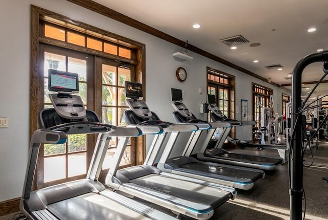 exercise room with recessed lighting, french doors, visible vents, and crown molding