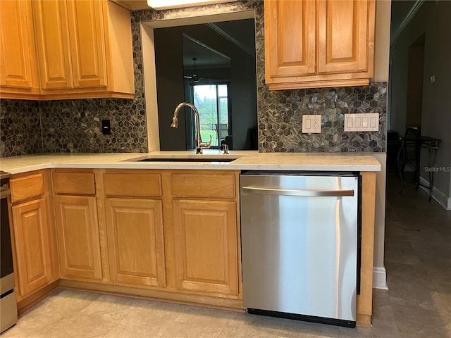 kitchen with a sink, light countertops, stainless steel dishwasher, brown cabinets, and tasteful backsplash