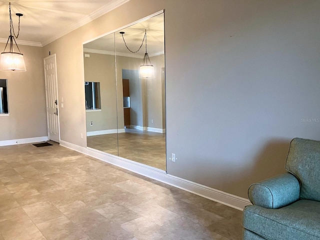 6815 Dali Ave Unit F101, Land O Lakes, FL 34637 - sitting room featuring baseboards and crown molding
