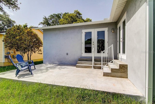 view of patio featuring entry steps and french doors