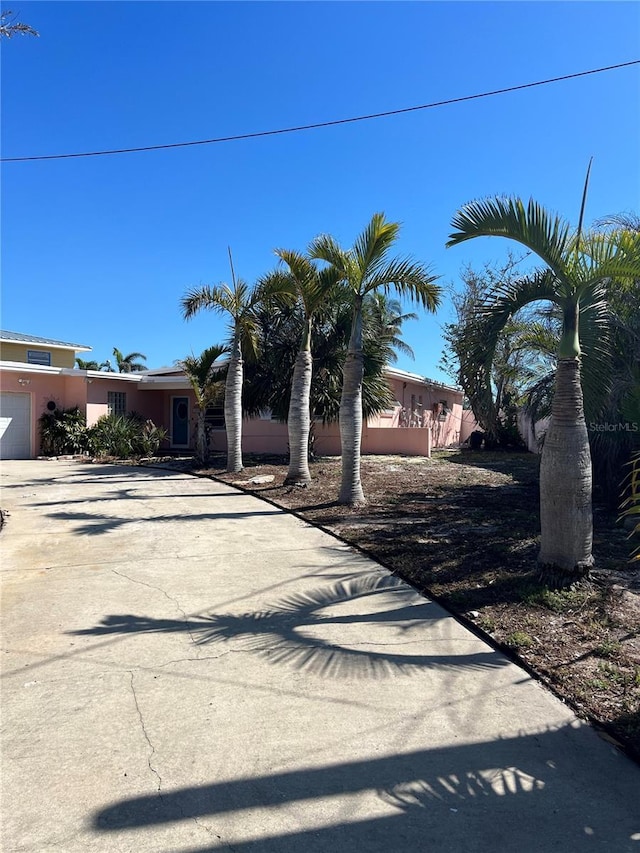 view of street with driveway