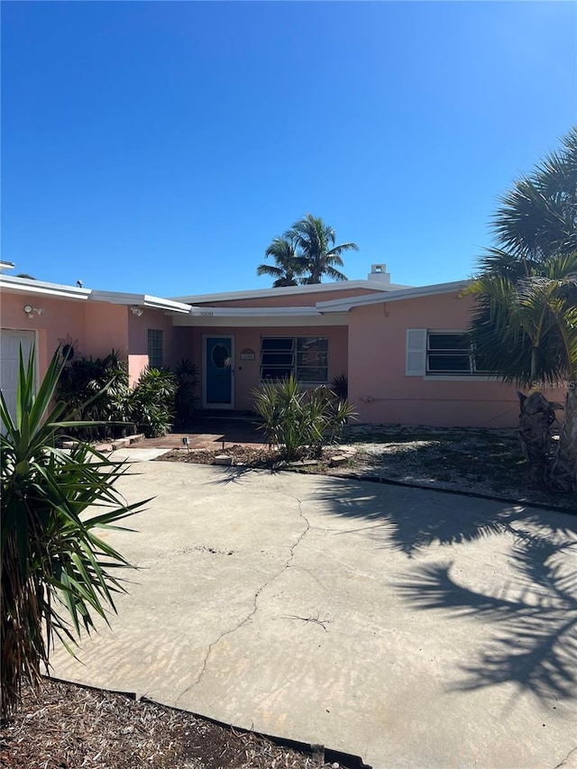 view of front of property featuring stucco siding