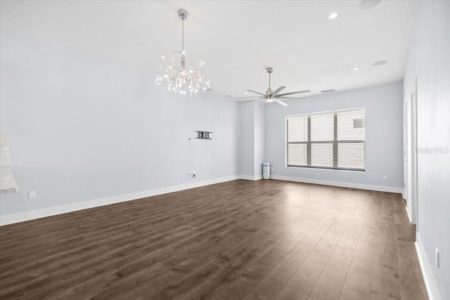 spare room with dark wood-style floors, recessed lighting, ceiling fan, and baseboards