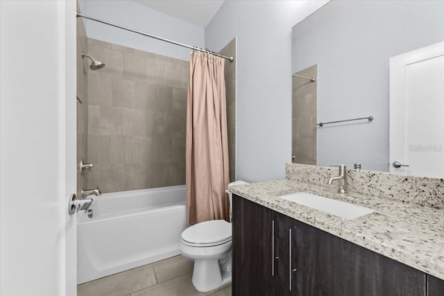 full bath with vanity, shower / bath combination with curtain, toilet, and tile patterned floors