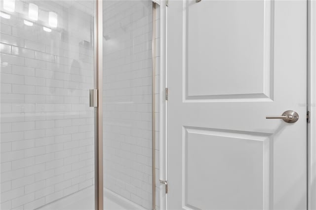 bathroom featuring a stall shower