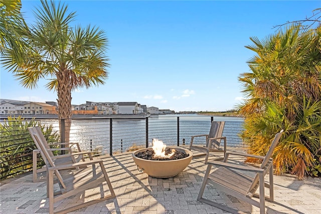 view of patio with an outdoor fire pit