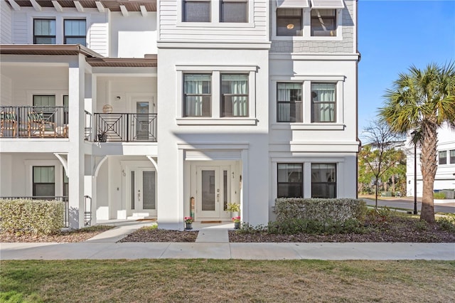 view of property featuring stucco siding