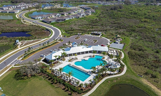 aerial view featuring a water view and a residential view